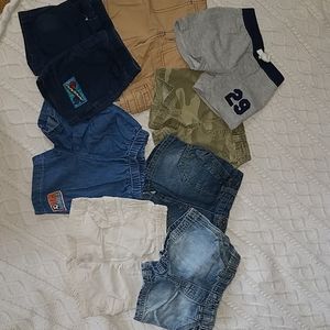8 pairs assorted shorts 6-12 mos